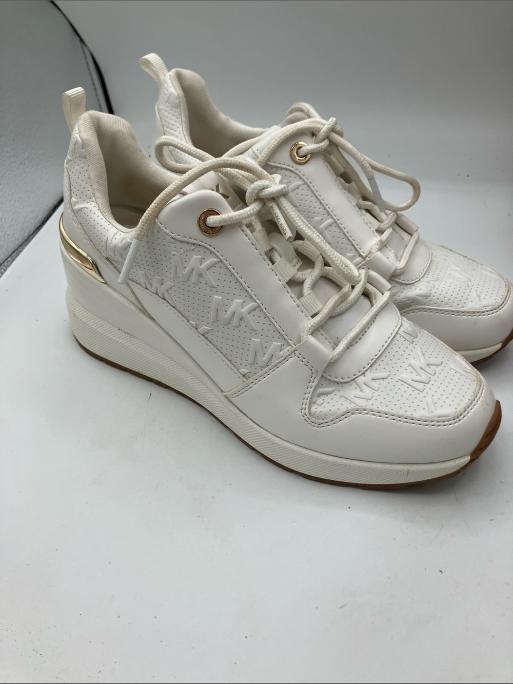 Michael Kors Cream Logo Wedge Sneakers with Gold Accents